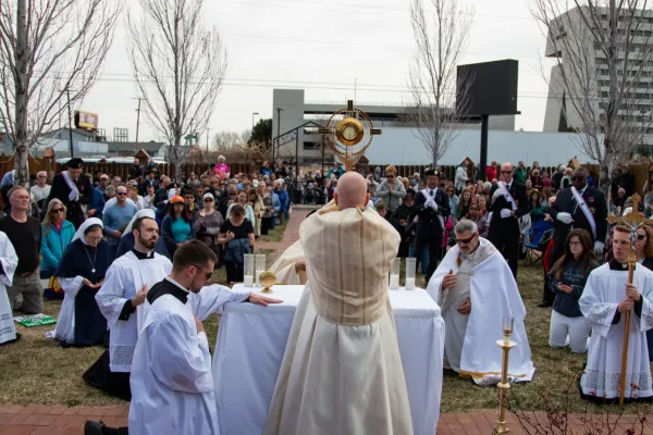 Archbishop Samuel J. Aquila offers benediction, a eucharistic blessing, to all of those present for the pro-life procession around Planned Parenthood. André Escaleira, Jr./Denver Catholic