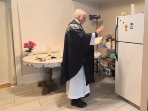 Father Bill Kuchinsky prays over the remains of 115 aborted babies during a funeral Mass on April 1, 2022, in Washington, D.C. Pro-life activists who say they rescued the babies from an abortion clinic in the city stored the remains in an apartment refrigerator until the babies could be given a funeral Mass and a dignified burial. Courtesy of Father Bill Kuchinsky