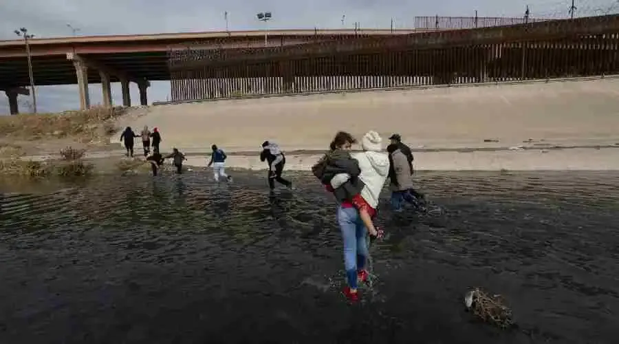 Migrants illegally cross the Rio Grande between designated U.S.-Mexico ports of entry.?w=200&h=150