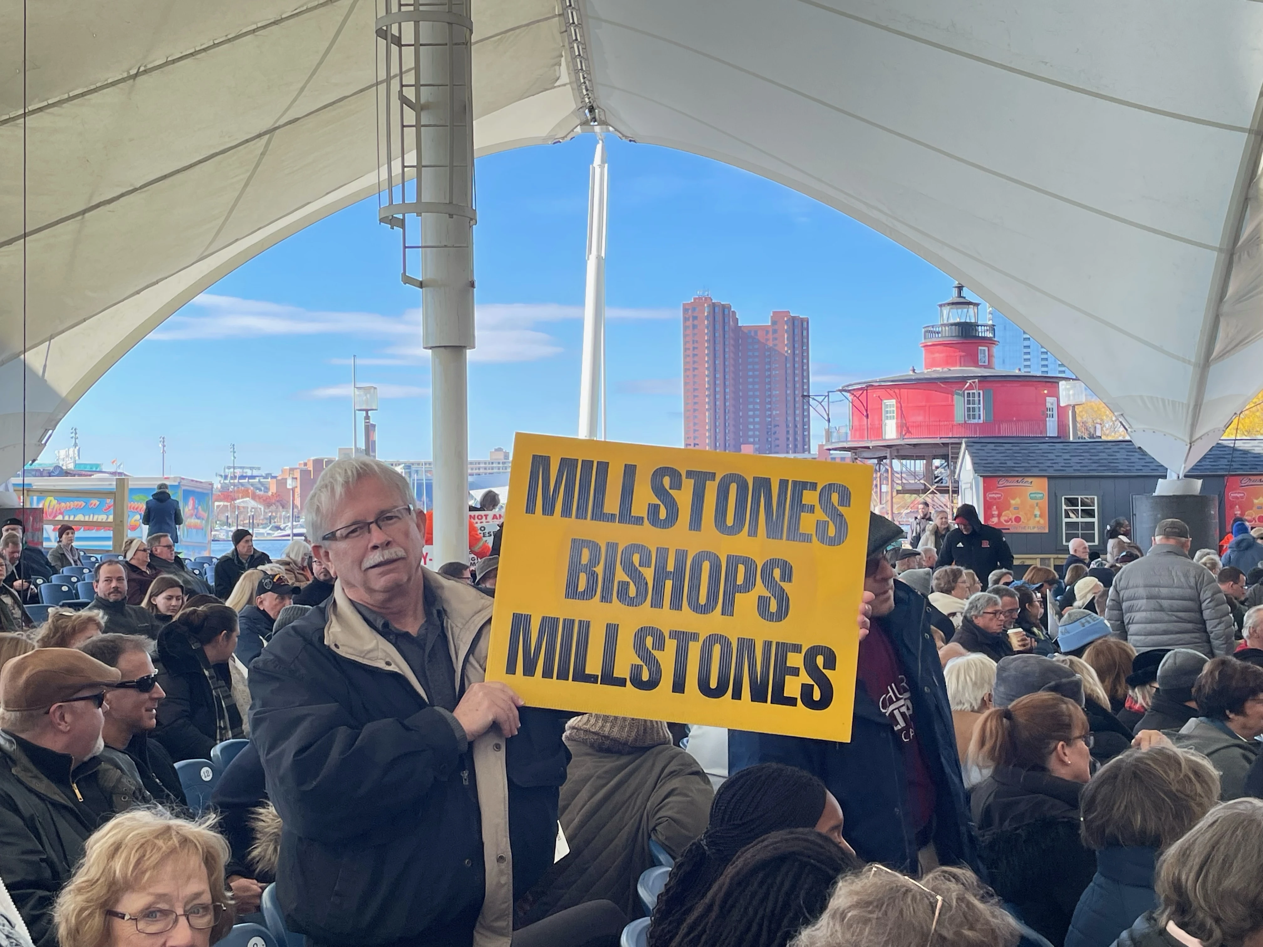 A demonstrator at the "Enough is Enough" rally in Baltimore Nov. 16 outside the fall assembly of the United States Conference of Catholic Bishops.?w=200&h=150