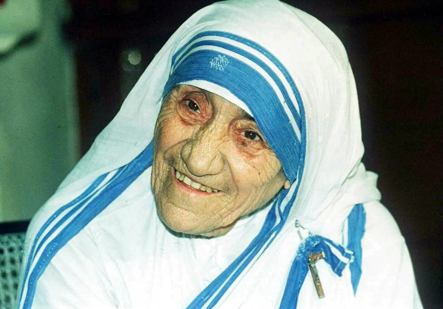 Mother Teresa smiles as she poses for photographers in Calcutta, India, on April 12, 1995.?w=200&h=150