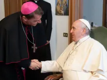 Pope Francis greets German Bishop Stefan Oster on May 2, 2022.