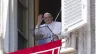 Pope Francis waves to pilgrims during the Angelus Aug. 14, 2022.