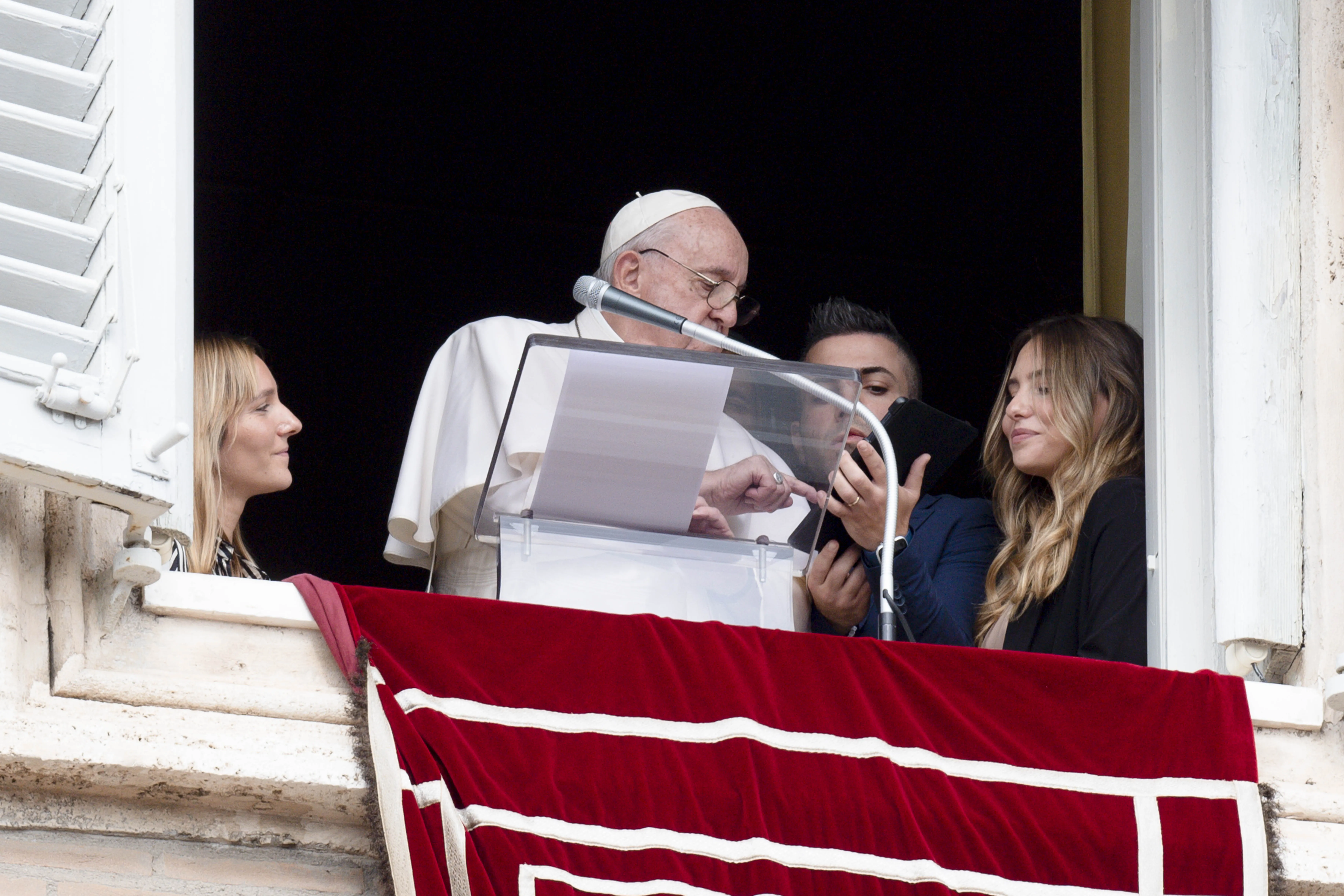Pope Francis registers for World Youth Day 2023 at the end of his Angelus address on Oct. 23, 2022.?w=200&h=150