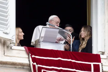 Pope Francis registers for World Youth Day 2023 at the end of his Angelus address on Oct. 23, 2022.