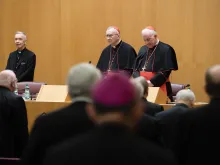 Facing the German bishops in Rome, Nov. 18, 2022: Cardinal Luis Ladaria Ferrer, SJ, prefect of the Dicastery of the Doctrine of the Faith; Cardinal Pietro Parolin, secretary of state; and Cardinal Marc Ouellet, PSS, prefect of the Dicastery of Bishops (from left).