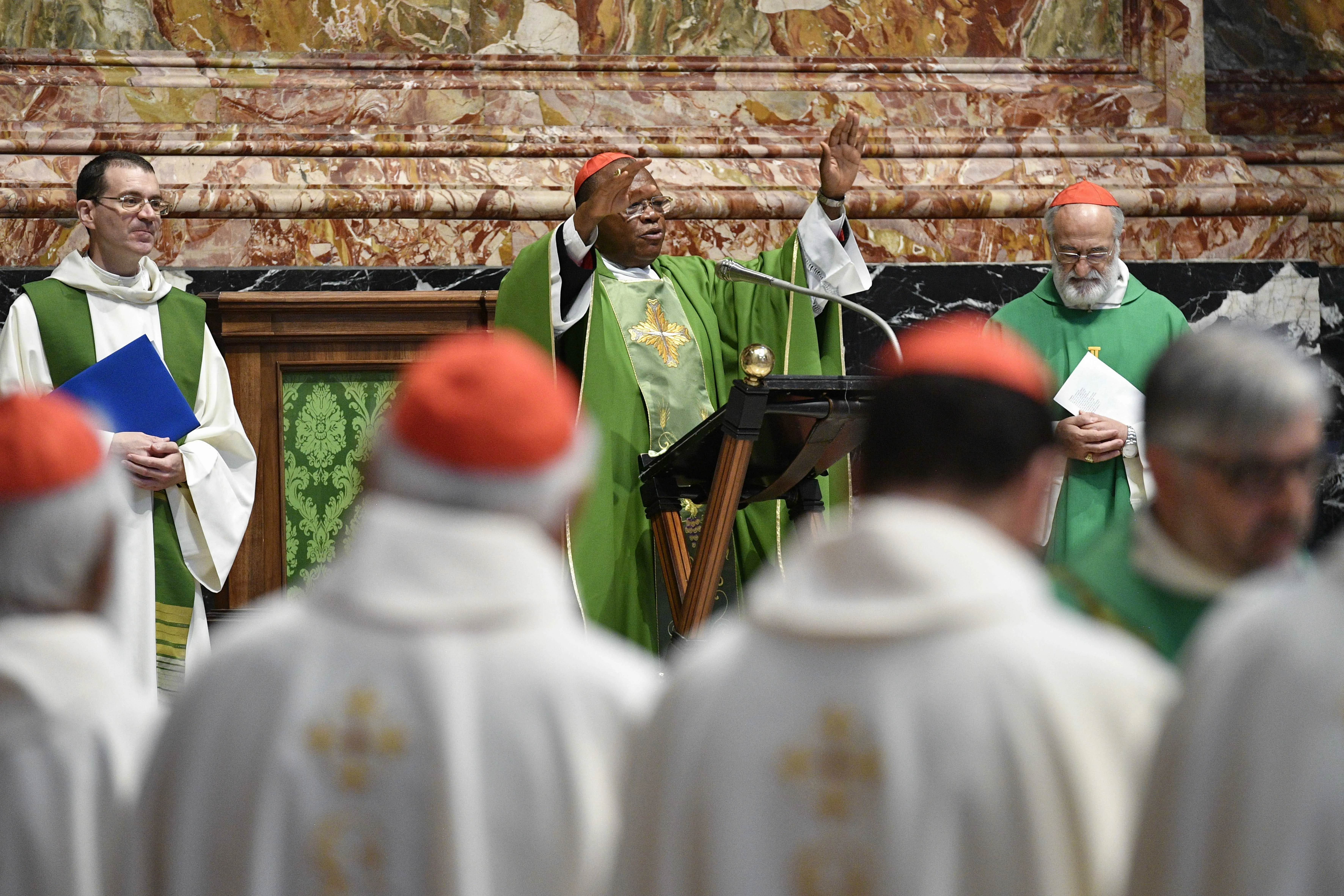 Cardinal Fridolin Ambongo Besungu, OFM Cap., was the main celebrant of a Mass in St. Peter’s Basilica for synod participants on Oct. 13.?w=200&h=150