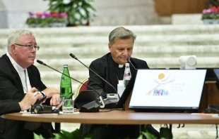 Cardinal Jean-Claude Hollerich (left), relator general of the Synod on Synodality, and Cardinal Mario Grech, secretary general of the Synod, at the Oct. 9, 2023, general congregation. Credit: Vatican Media