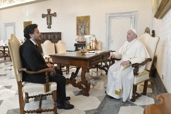 Pope Francis speaking with Dritan Abazović, prime minister of Montenegro, on Oct. 10, 2022, at the Vatican. Vatican Media