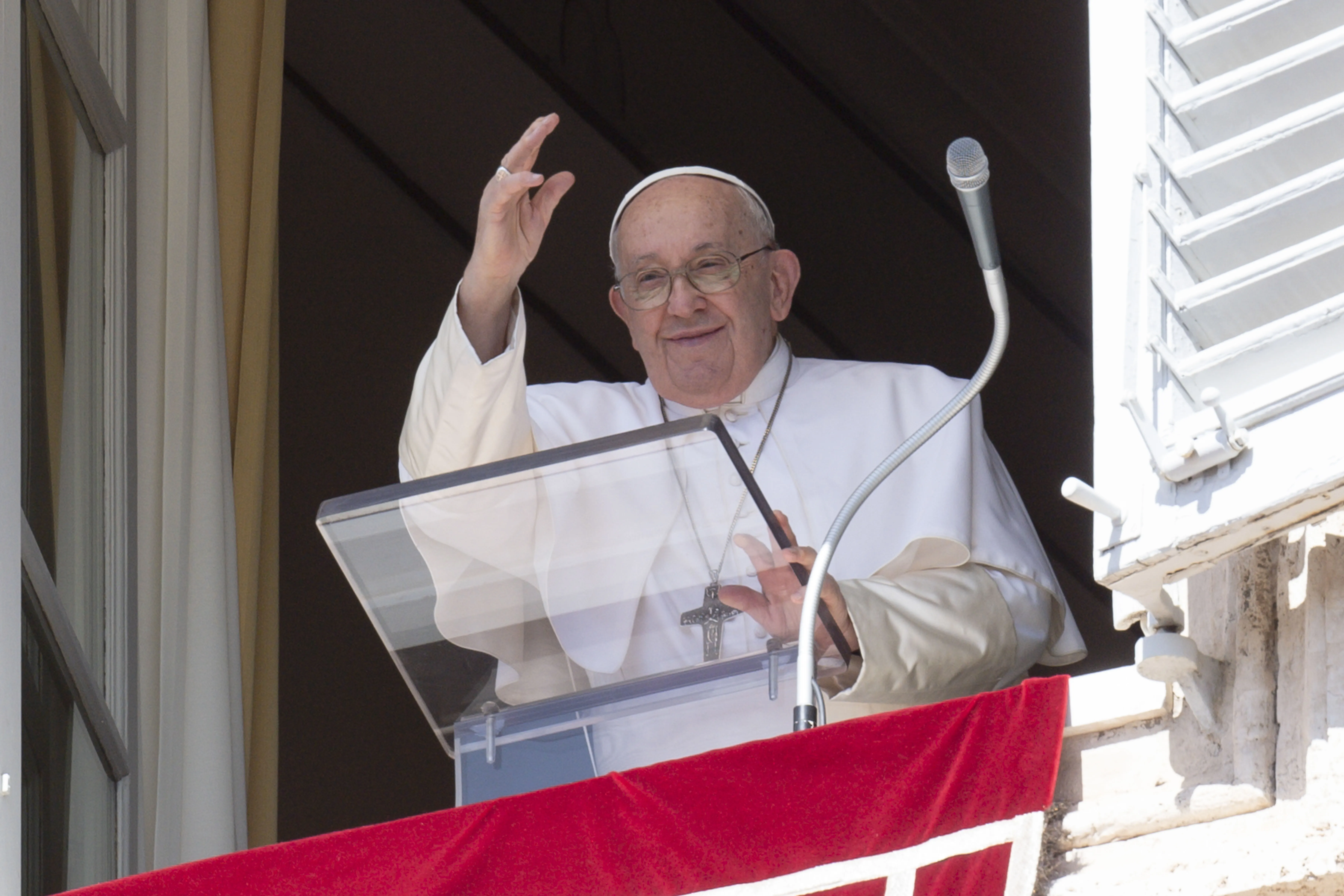 Pope Francis greets the crowd gathered in St. Peter's Square for his Angelus address on Sept. 24, 2023.?w=200&h=150