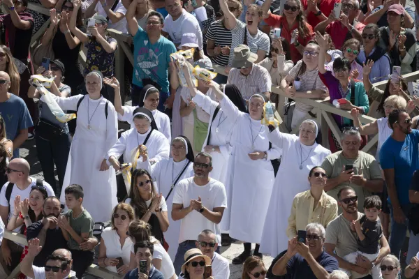 Waves from the crowd gathered in St. Peter's Square for the pope's Angelus address on Sept. 24, 2023. Vatican Media