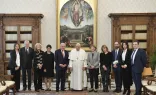 Pope Francis with members of the group Leaders Pour la Paix at the Vatican, Dec. 2, 2022
