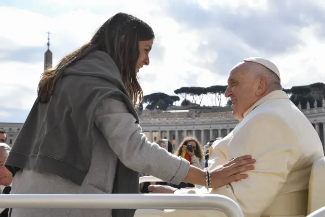 Pope Francis greets pilgrims from the pope mobile in St. Peter’s Square on April 5, 2023.