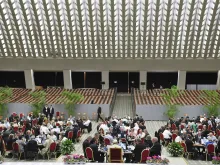 Delegates meet at round tables during the Synod on Synodality on Oct. 10, 2023.