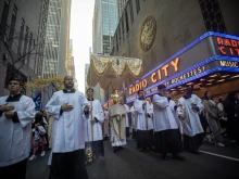A Eucharistic procession sponsored by the Napa Institute passes by Radio City Music Hall in New York City on Oct. 15, 2024.