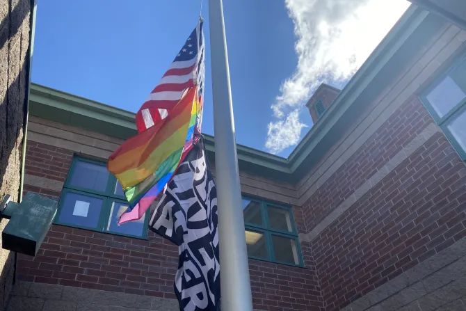 American, gay pride, and BLM flags being flown at Nativity School of Worcester in Worcester, Mass.