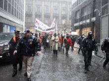 Pro-lifers march through lower Manhattan amid a heavy downpour and pro-abortion protests necessitating a significant police presence on March 23, 2024.