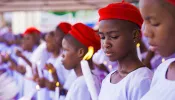A group of school girls receiving the sacraments of baptism and confirmation in Onitsha, Anambra, Nigeria, on May 30, 2022.