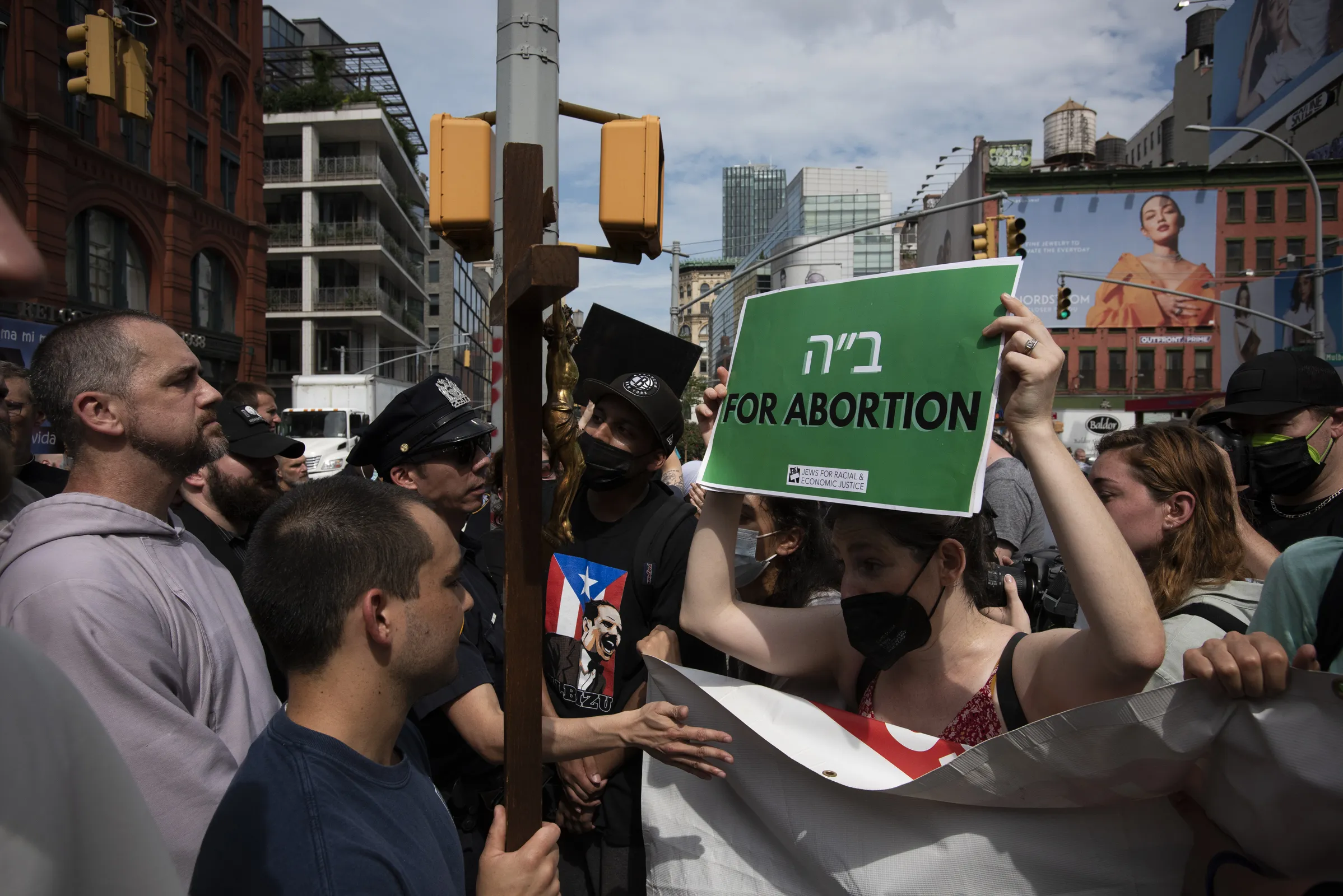 Father Fidelis Moscinski (far left, in gray robe), a well-known pro-life activist and priest of the Franciscan Friars of the Renewal (CFR) is seen during a tense standoff between pro-life and pro-abortion demonstrators in Lower Manhattan on July 2, 2022.?w=200&h=150