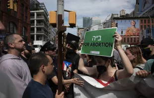 Father Fidelis Moscinski (far left, in gray robe), a well-known pro-life activist and priest of the Franciscan Friars of the Renewal (CFR), is seen during a tense standoff between pro-life and pro-abortion demonstrators in Lower Manhattan on July 2, 2022. Jeffrey Bruno/CNA