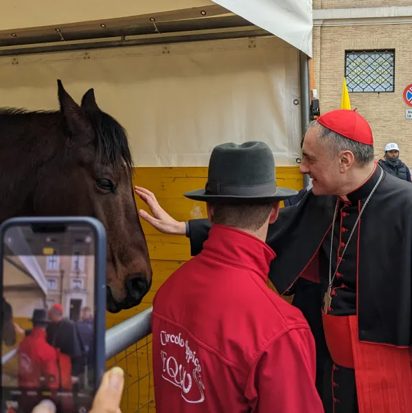 Cardinal Mauro Gambetti, the archpriest of St. Peter’s Basilica, individually greeted many of the animals after offering a blessing on the feast of St. Anthony Abbot, Jan. 17, 2023. Alan Koppschall/EWTN
