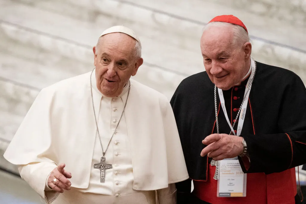 Pope Francis arrives with Cardinal Marc Ouellet (R) of Canada for the opening of three-day Symposium on priesthood in the Paul VI hall at the Vatican on Feb. 17, 2022.?w=200&h=150