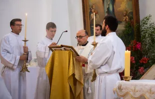 Father Gabriel Romanelli (center), the Latin parish priest of Gaza, is among the celebrants at a Mass to celebrate the feast day of Our Lady, Queen of Palestine and the Holy Land at the shrine dedicated to her at Deir Rafat on Sunday, Oct. 29, 2023. Credit: Marinella Bandini