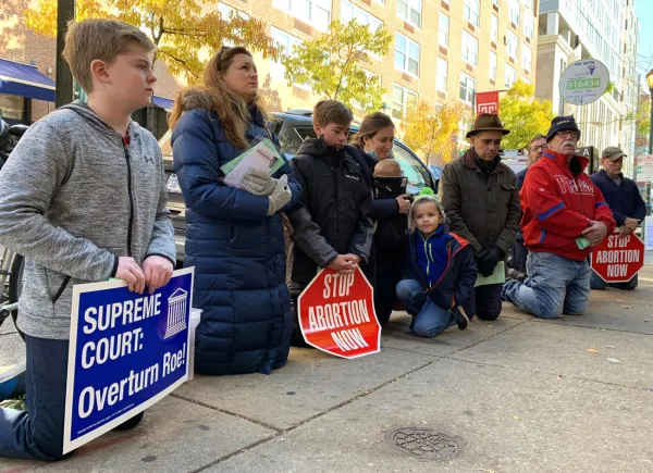 Pro-life advocate Ashley Garecht (second left) joined some 30 others at a Dec. 1, 2021 prayer vigil outside a Philadelphia Planned Parenthood site, an event organized by the Pro-Life Union of Greater Philadelphia. Gina Christian/CatholicPhilly.com