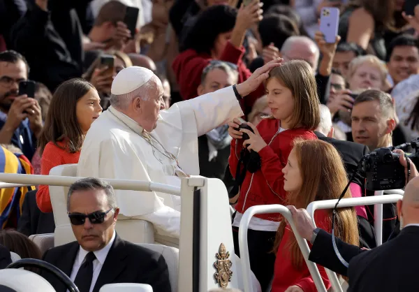 Pope Francis blessed a child at the general audience on St. Peter's Square, Sept. 28, 2022. Pablo Esparza / CNA