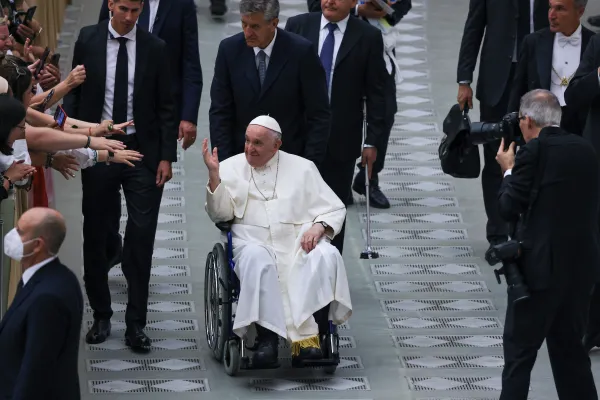 Pope Francis greets pilgrims from a wheelchair after the general audience Aug. 17, 2022. Pablo Esparza/CNA