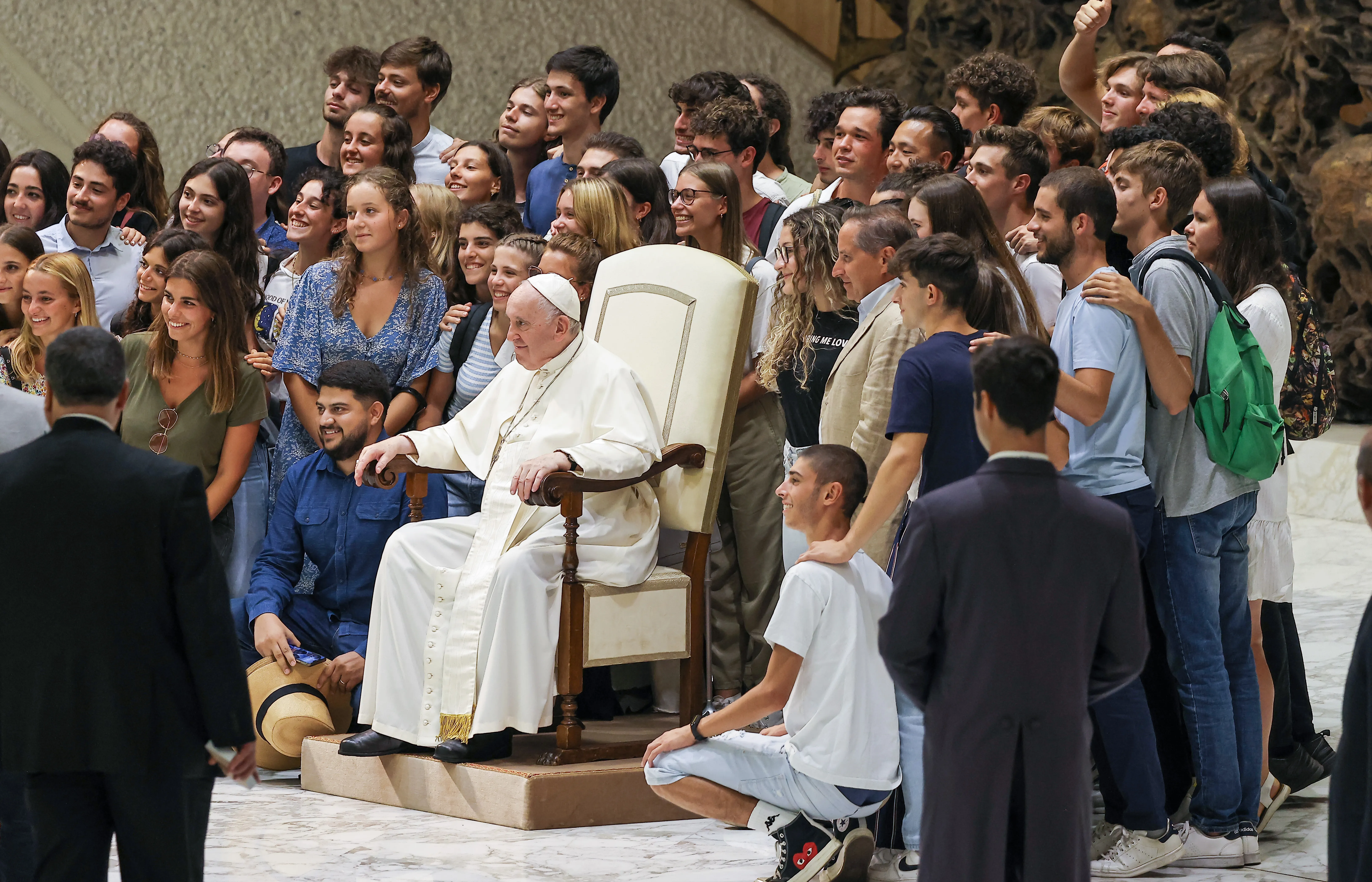 Pope Francis poses for a photo with a group of young people after his general audience Aug. 17, 2022.?w=200&h=150