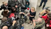 Päivi Räsänen, Finland’s interior minister from 2011 to 2015, speaks to reporters while holding her Bible at Helsinki District Court on Jan. 24, 2022.