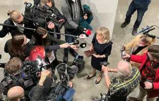 Päivi Räsänen, Finland’s interior minister from 2011 to 2015, speaks to reporters while holding her Bible at Helsinki District Court on Jan. 24, 2022. ADF International.
