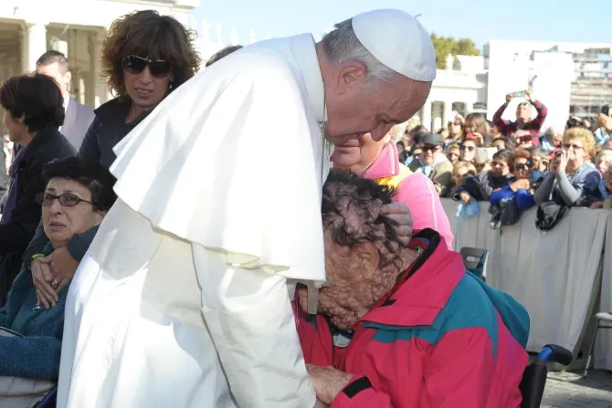 Pope Francis embraces Vinicio Riva after the general audience on Nov. 6, 2013.?w=200&h=150