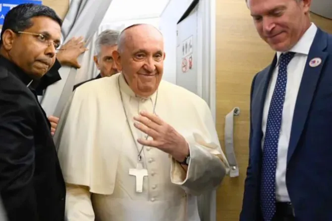 Pope Francis on board the plane that took him from Rome to Mongolia, Aug. 31, 2023.?w=200&h=150