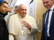 Pope Francis on board the plane that took him from Rome to Mongolia, Aug. 31, 2023.