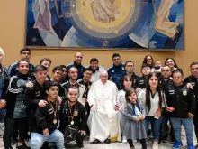 Pope Francis meets with the Argentine dwarf soccer team at an audience on Wednesday, Oct. 26, 2022, at the Vatican.