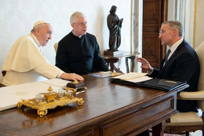 Pope Francis listens as Supreme Knight Patrick Kelly describes Knights of Columbus efforts to assist Ukrainians,  April 11, 2022.
