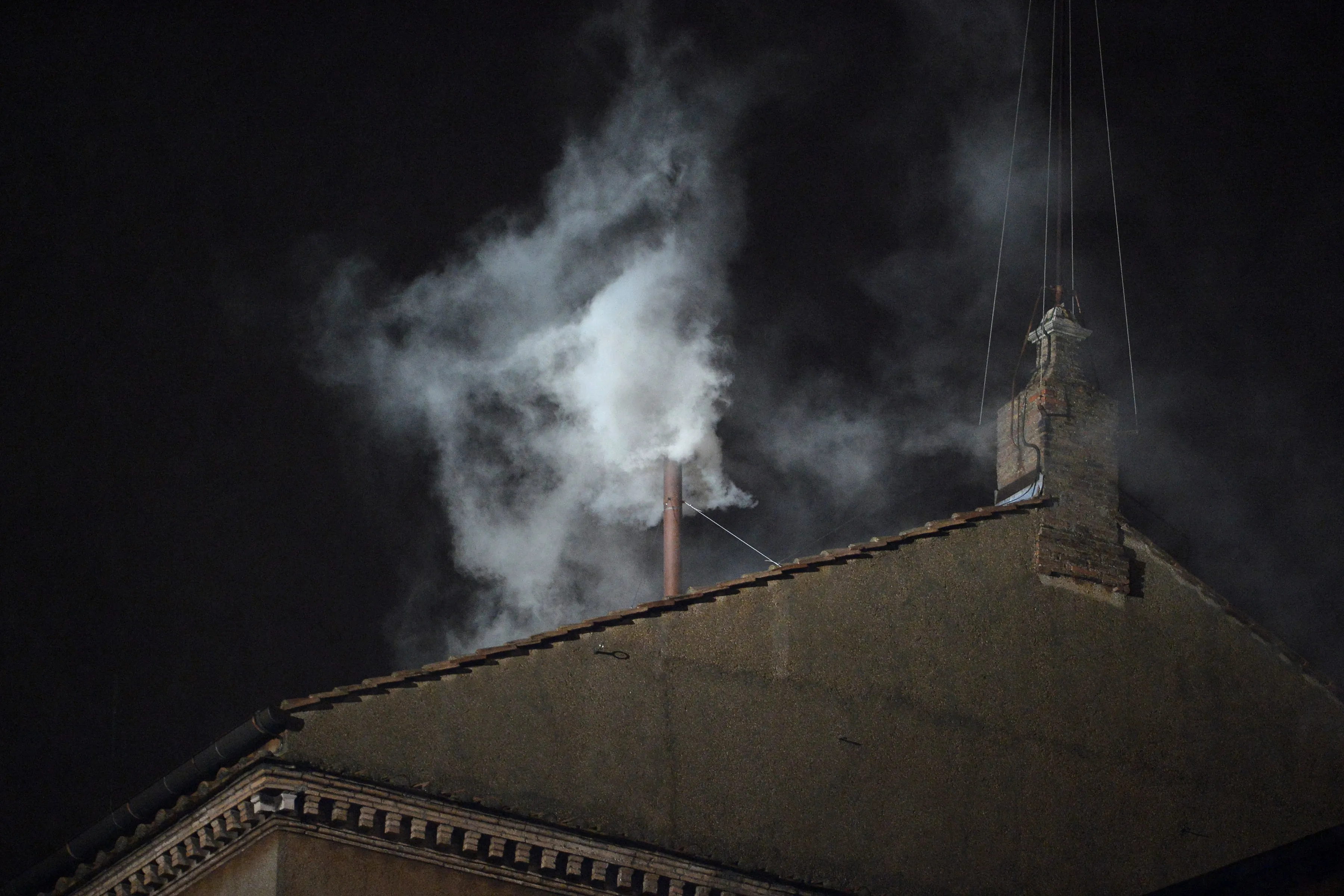 White smoke rises from the chimney of the Sistine Chapel on March 13, 2013, signaling that the College of Cardinals has elected a new pope.?w=200&h=150
