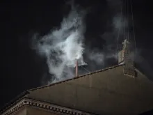 White smoke rises from the chimney of the Sistine Chapel on March 13, 2013, signaling that the College of Cardinals has elected a new pope.