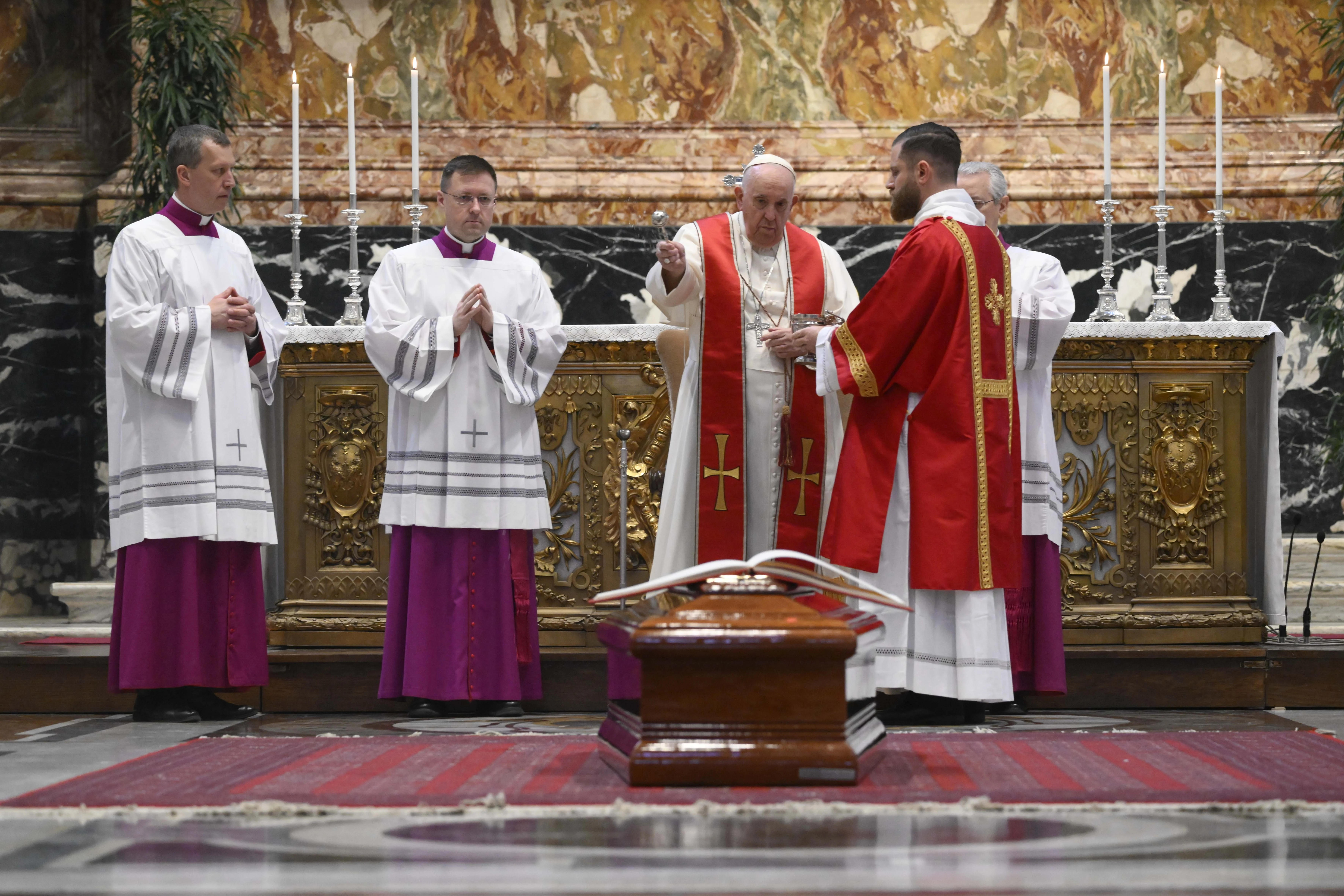 Pope Francis blesses the coffin of Cardinal George Pell at the Australian prelate's funeral Mass in St. Peter's Basilica on Jan. 14, 2023.?w=200&h=150