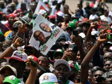 Supporters hold a placard with pictures of the candidate of the Labour Party Peter Obi and running mate Datti Baba-Ahmed during a campaign rally of the party in Lagos, Nigeria, on Feb. 11, 2023.