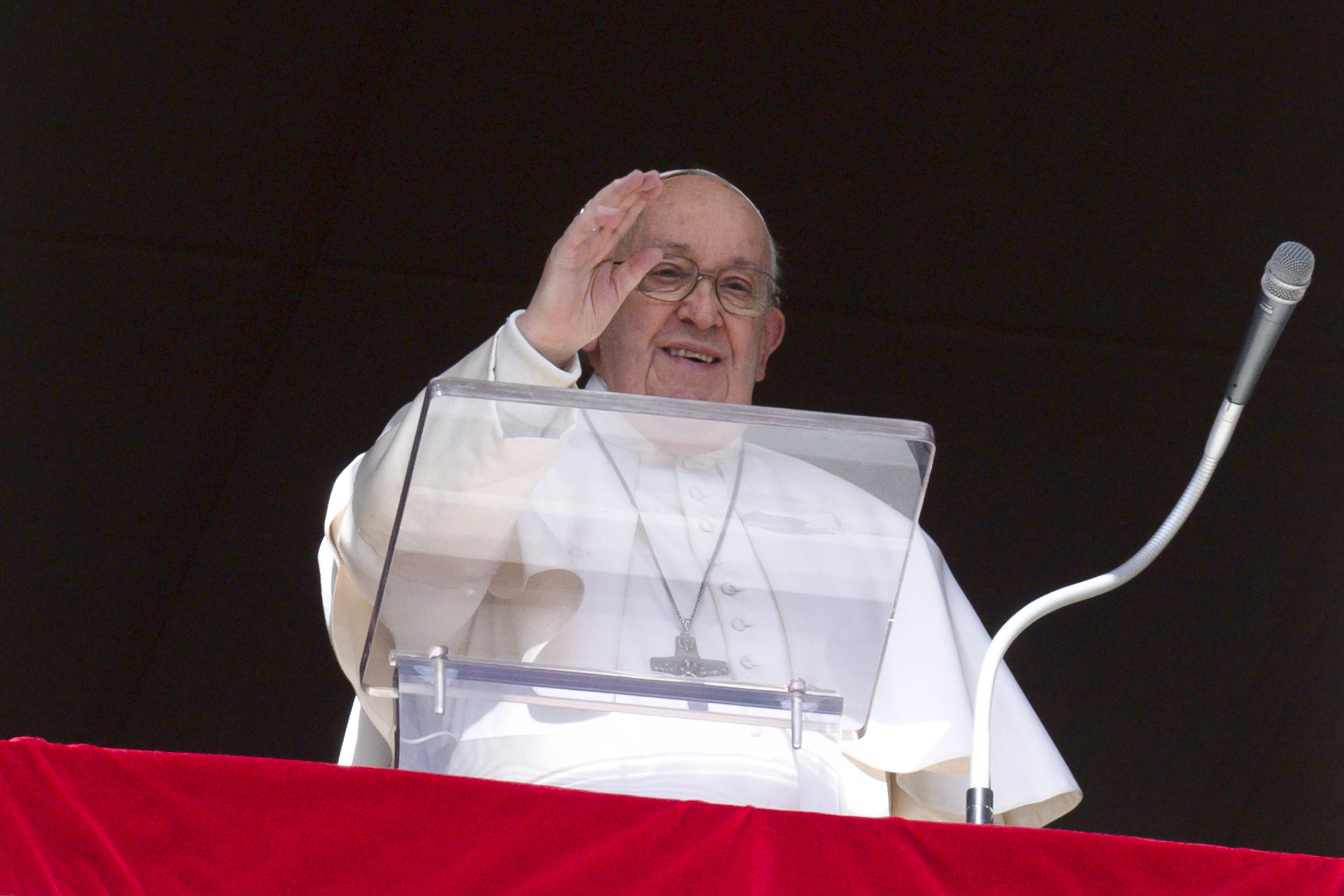 Pope Francis waves to pilgrims in St. Peter's Square on Feb. 25, 2024, during his weekly Angelus reflection. The pope canceled his audiences the day before due to mild flu conditions, according to the Vatican.?w=200&h=150