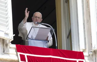 Pope Francis blesses the crowd from a window overlooking St. Peter's Square at the end of his Sunday Angelus address Aug. 13, 2023. Vatican Media.