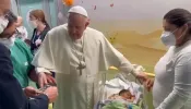 Pope Francis baptizes a baby at Gemelli Hospital in Rome on March 31, 2023.