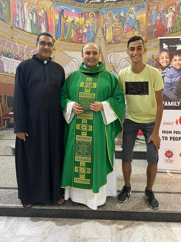 The parish priest of Gaza, Father Gabriel Romanelli, in the middle. On the left is his vicar, Father Iusuf Asad; on the right is Suhail Shadi Abu Dawod. The picture was taken in the summer 2023 inside the Latin church of the Holy Family in Gaza City. The parish is entrusted to the priests of the Institute of the Incarnate Word (IVE). Credit: Courtesy of Father Gabriel Romanelli