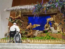 Pope Francis spent time in silent prayer in front of a nativity scene handmade by artisan craftsmen in Guatemala on Dec. 3, 2022.