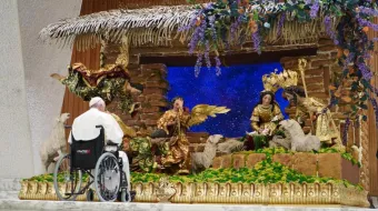 Pope Francis spent time in silent prayer in front of a nativity scene handmade by artisan craftsmen in Guatemala on Dec. 3, 2022.
