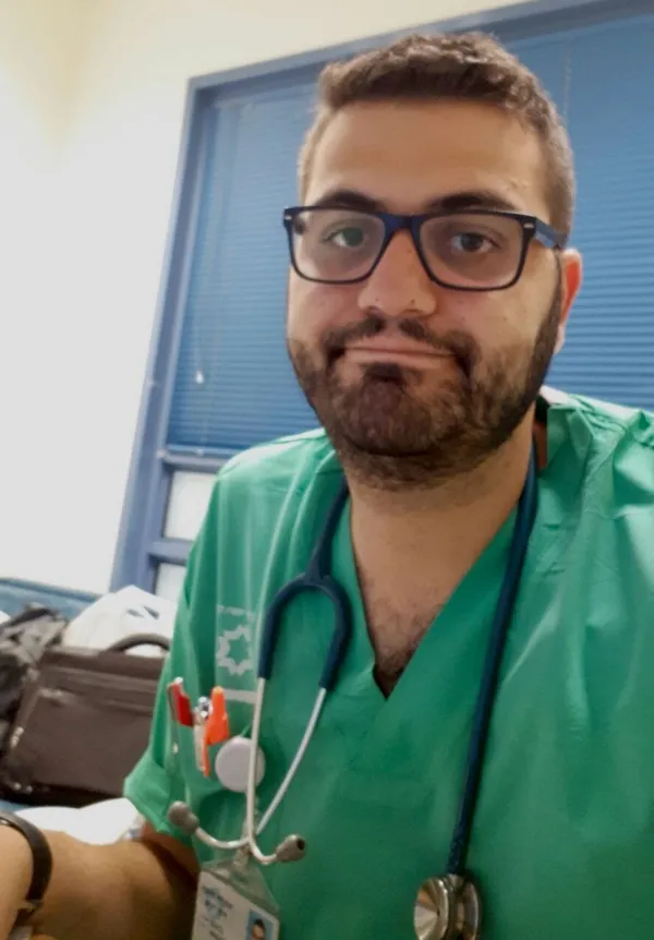 Hussam Abu Sini is a Catholic medical doctor who lives in Haifa with his life Chiara and their two young children. He said if the war continues to worsen he will stay to help. October 2023. Credit: Photo courtesy of Hussam Abu Sini