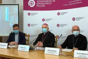 Bishop Artur Miziński and Archbishop Georges Bacouni at a press conference in Warsaw, Poland, Nov. 10, 2021